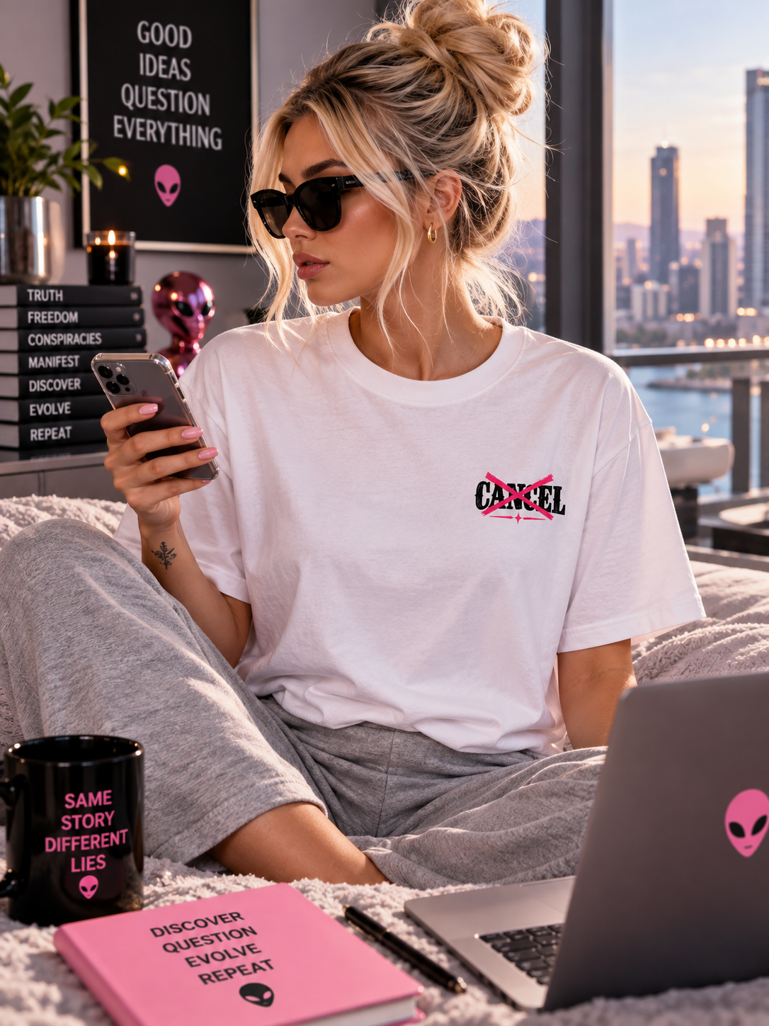 Woman wearing the Cancel Cancel Culture statement T-shirt showing the small crossed-out Cancel front design while scrolling her phone.