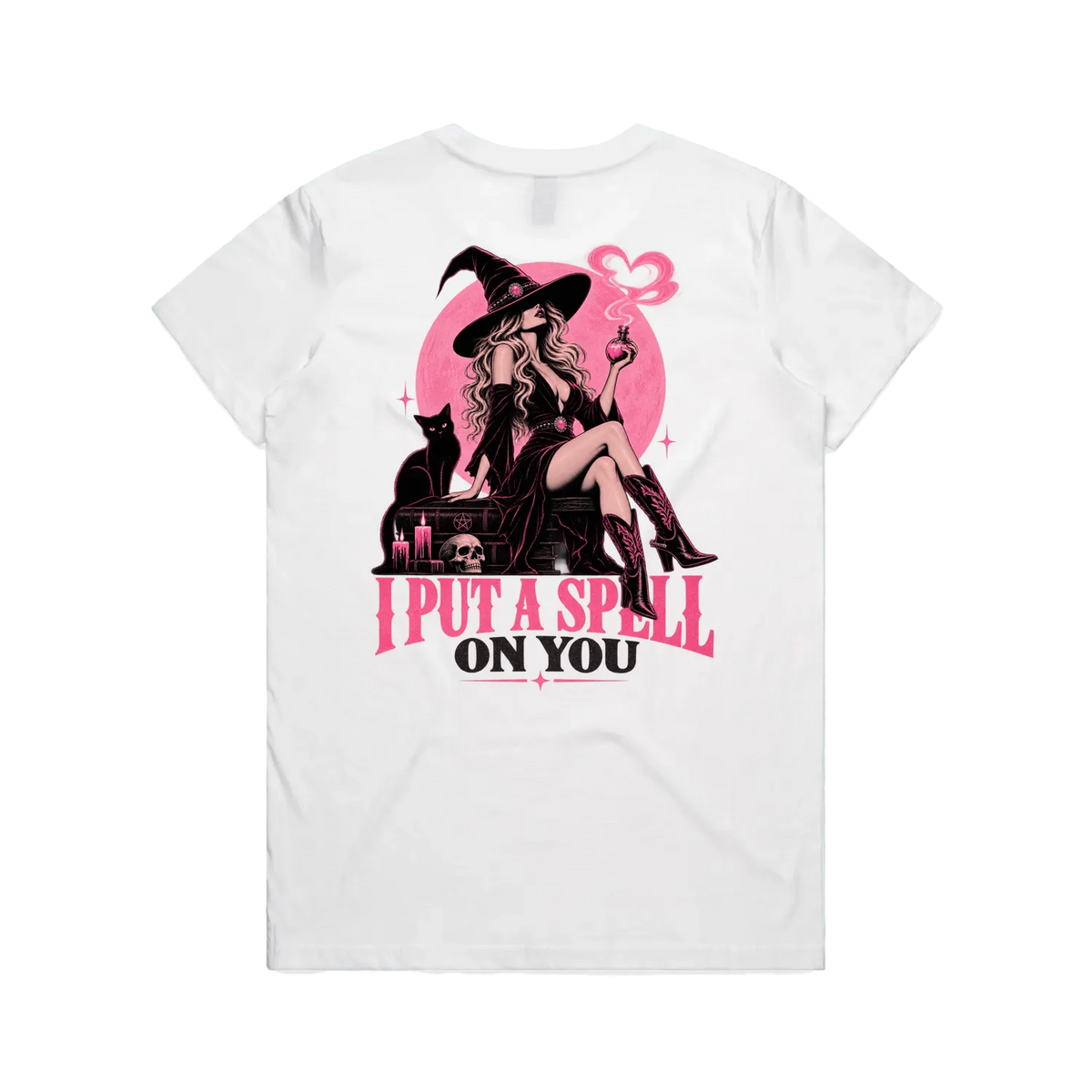 White short-sleeve t-shirt with a large graphic print on the front featuring a witch, black cat, pink circle, and the text 'I PUT A SPELL ON YOU' in pink and black.